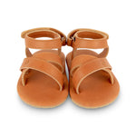 Giggles summer baby sandals. Brand: Donsje Colour: Camel classic Details: Handmade & Fairtrade, Adjustable velcro fastening strap Anti slip suede outsole (size: 0-6 & 6-12 months),  Rubber flexible sole (size: 12-18 & 18-24 months) Composition:  100% Premium leather