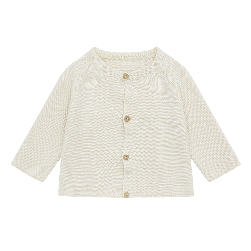 Brand: Vild  Colour: Ecru Details: Pure no-dye yarn of the highest quality, Incredibly soft, Eco-conscious, Round neck, Buttons at the front,   Composition: 100% Organic woven cotton  Made in: Portugal . comes in: ecru and palmetto colours. 
