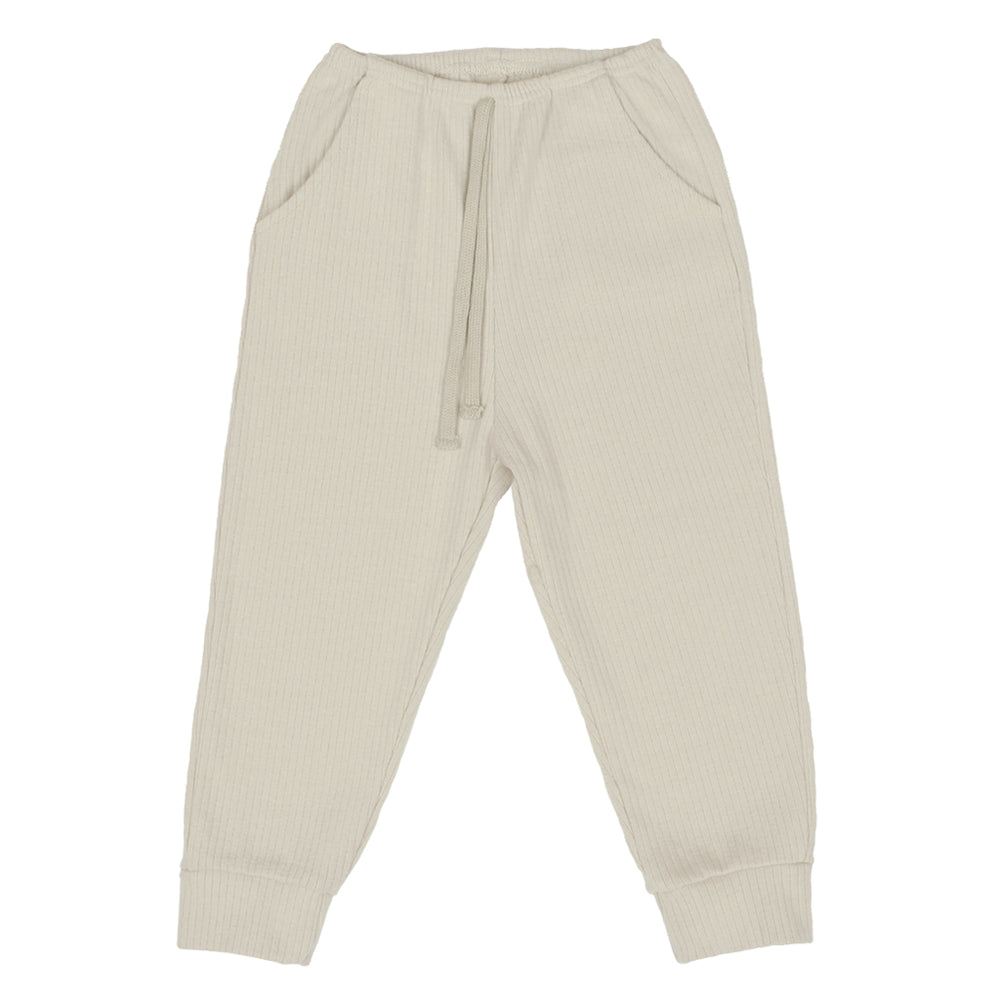 Myffy jogger pants comes in three colours: brown, cream and wine. Brand: Scon Details: Ribbed, Elastic waist, Slash pockets, Pocket at the back, Tightened at the ankles, Soft touch, Loose fit Composition: 95% Cotton, 5% Spandex Made in: Korea