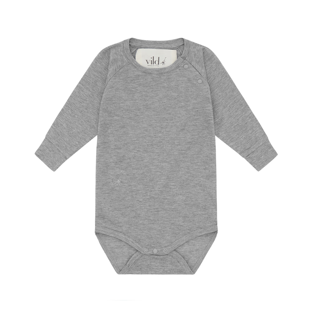Long sleeve bodysuit. Brand: Vild  Colour: Grey  Details: SeaCell composition fabric rich with the vitamins and minerals found in the plant, Incredibly soft, Eco-conscious, Carbon Neutral, Produced from sustainable raw materials  Composition: 28% SeaCellTM, 66% Cotton Made in: Portugal 