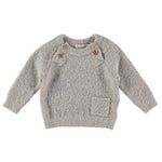 Búho jumper for babies in Ecru colour.  Details: Pocket on a left side, Two buttons each side of the neck for easy wear, long sleeve, round neck Composition: 70% Polyacrylic, 20% Polyamide, 10% Elastane